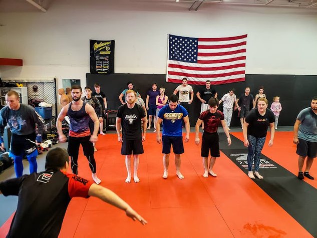 Titletown MMA Academy Roufusport Mixed Martial Arts Jiu Jitsu Muay Thai Boxing Self Defense Fitness gym photo